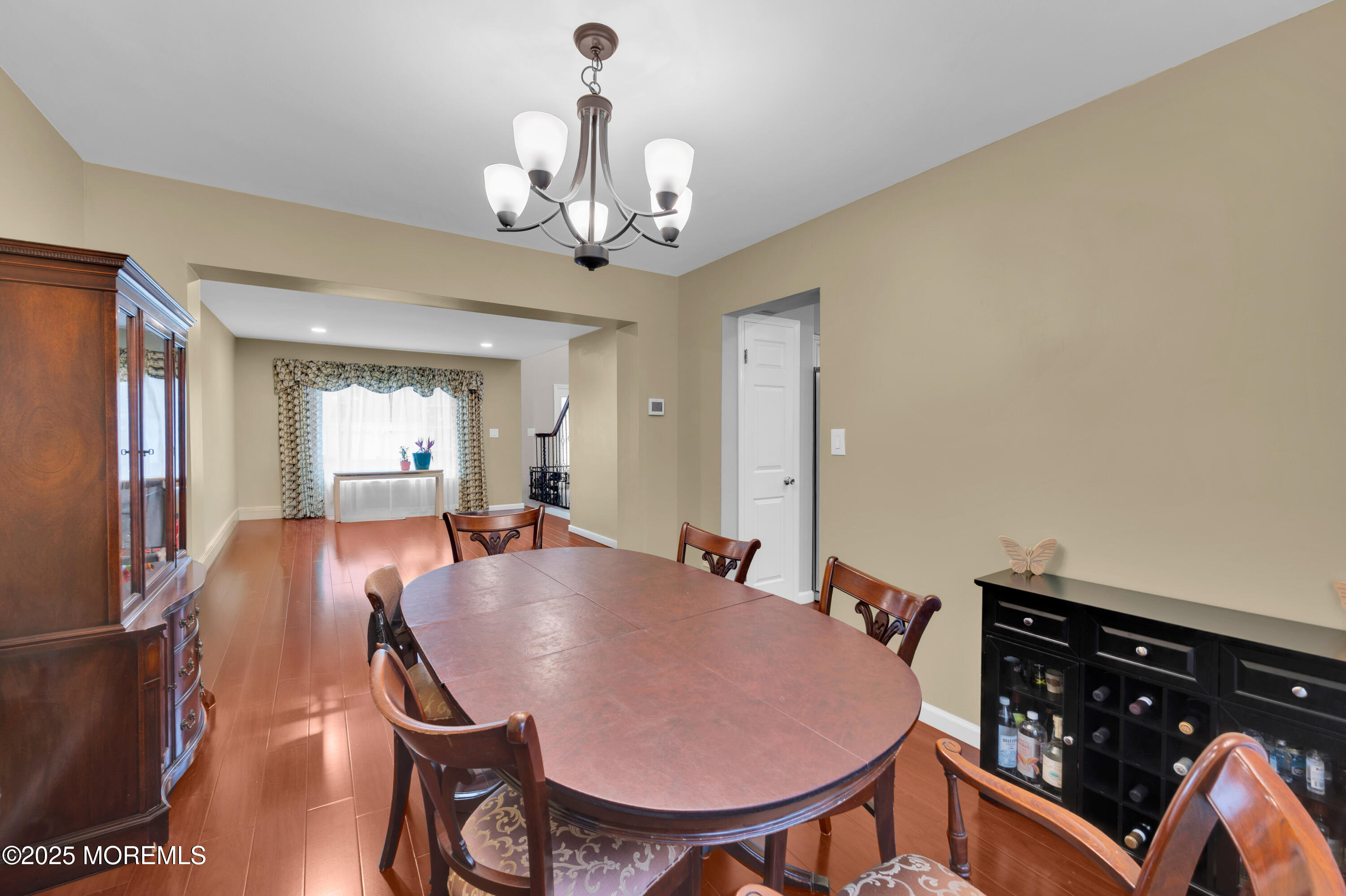76 Diamond Lane Howell, NJ 07731 - Photo 9 of 36 a view of a dining room with furniture and chandelier