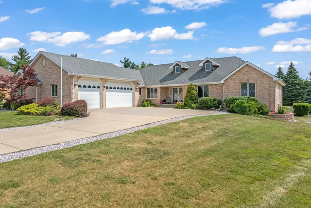 a house view with a garden space