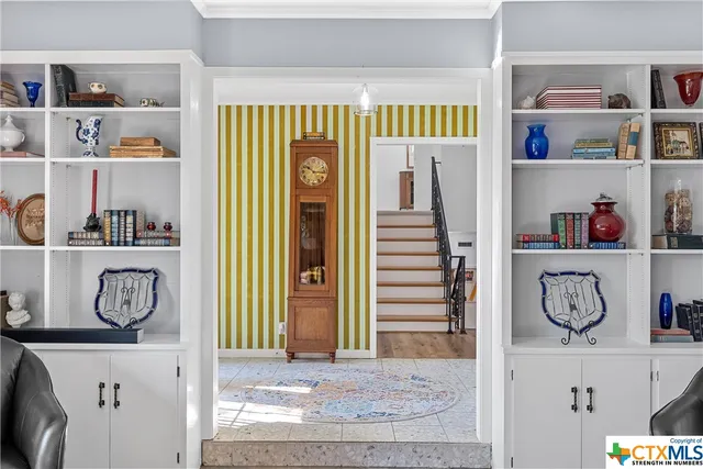 a kitchen with stainless steel appliances a sink and stove