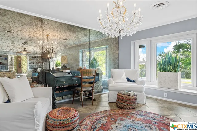 a kitchen with a sink a microwave a stove and refrigerator