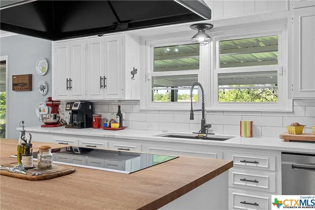a room with a book shelf and wooden floor