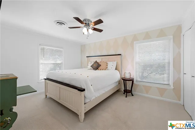 a view of a lake with a city