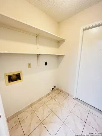 a bathroom with a sink mirror vanity and toilet