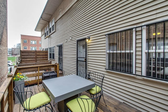 1007 East 61st Street Chicago, IL 60637 - Photo 9 of 20 a view of a patio with two chairs