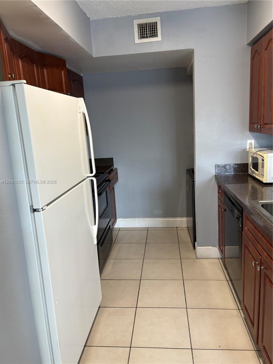 15231 Southwest 80th Street, Unit 602 Miami, FL 33193 - Photo 1 of 11
