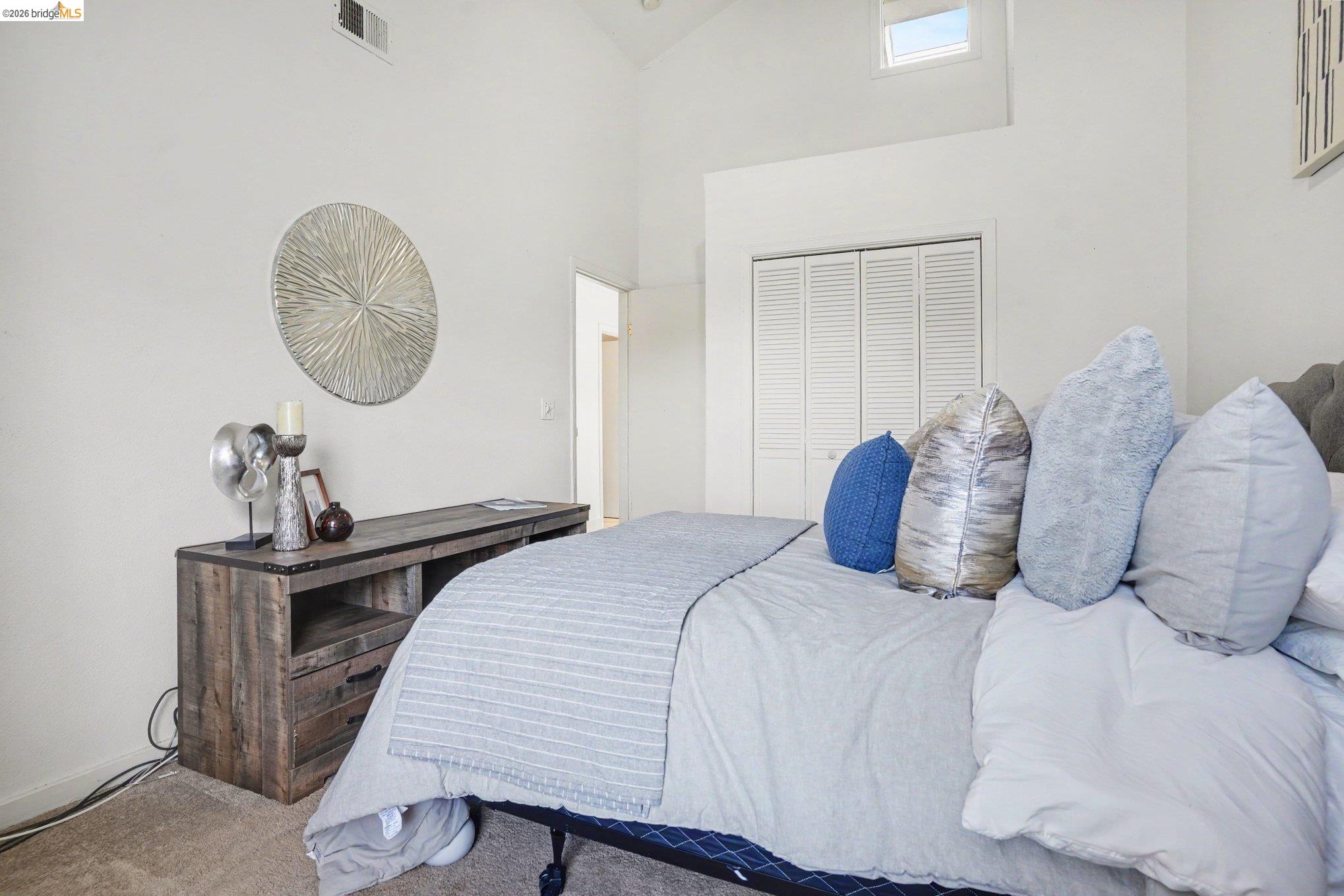 1433 Myrtle Street Oakland, CA 94607 - Photo 18 of 25 Vaulted ceilings highlighting a high-set window