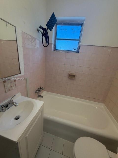 2368 Northwest 3rd Street, Unit 4 Miami, FL 33125 - Photo 11 of 20 a bathroom with a bath tub a sink and mirror