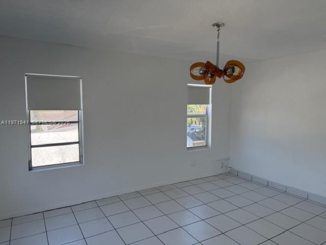 2368 Northwest 3rd Street, Unit 4 Miami, FL 33125 - Photo 14 of 20 an empty room with a window