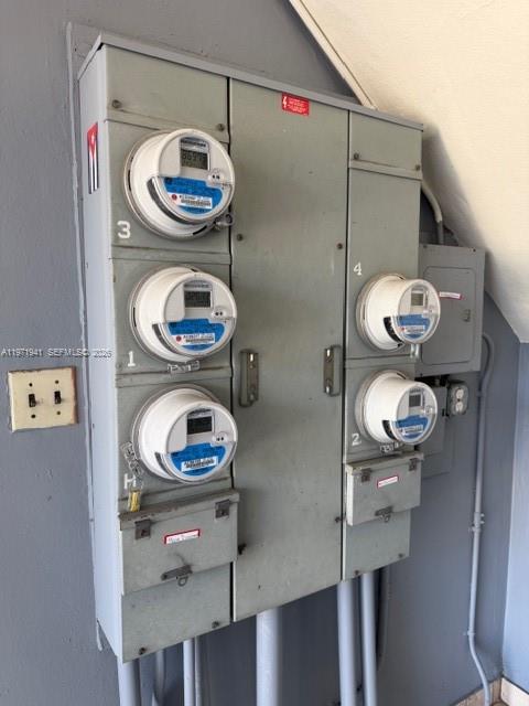 2368 Northwest 3rd Street, Unit 4 Miami, FL 33125 - Photo 19 of 20 a bathroom with a sink a toilet and a mirror