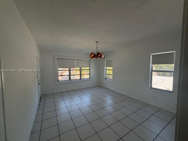 2368 Northwest 3rd Street, Unit 4 Miami, FL 33125 - Photo 5 of 20 a view of an empty room and window