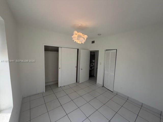 2368 Northwest 3rd Street, Unit 4 Miami, FL 33125 - Photo 8 of 20 an empty room with closet