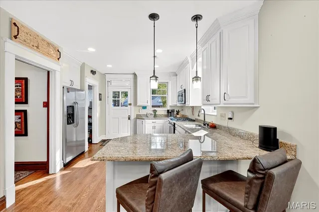 $670,000 | 7498 Teasdale Avenue, University City, MO 63130