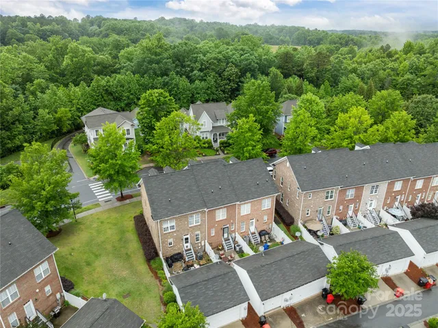 an aerial view of a house with a garden