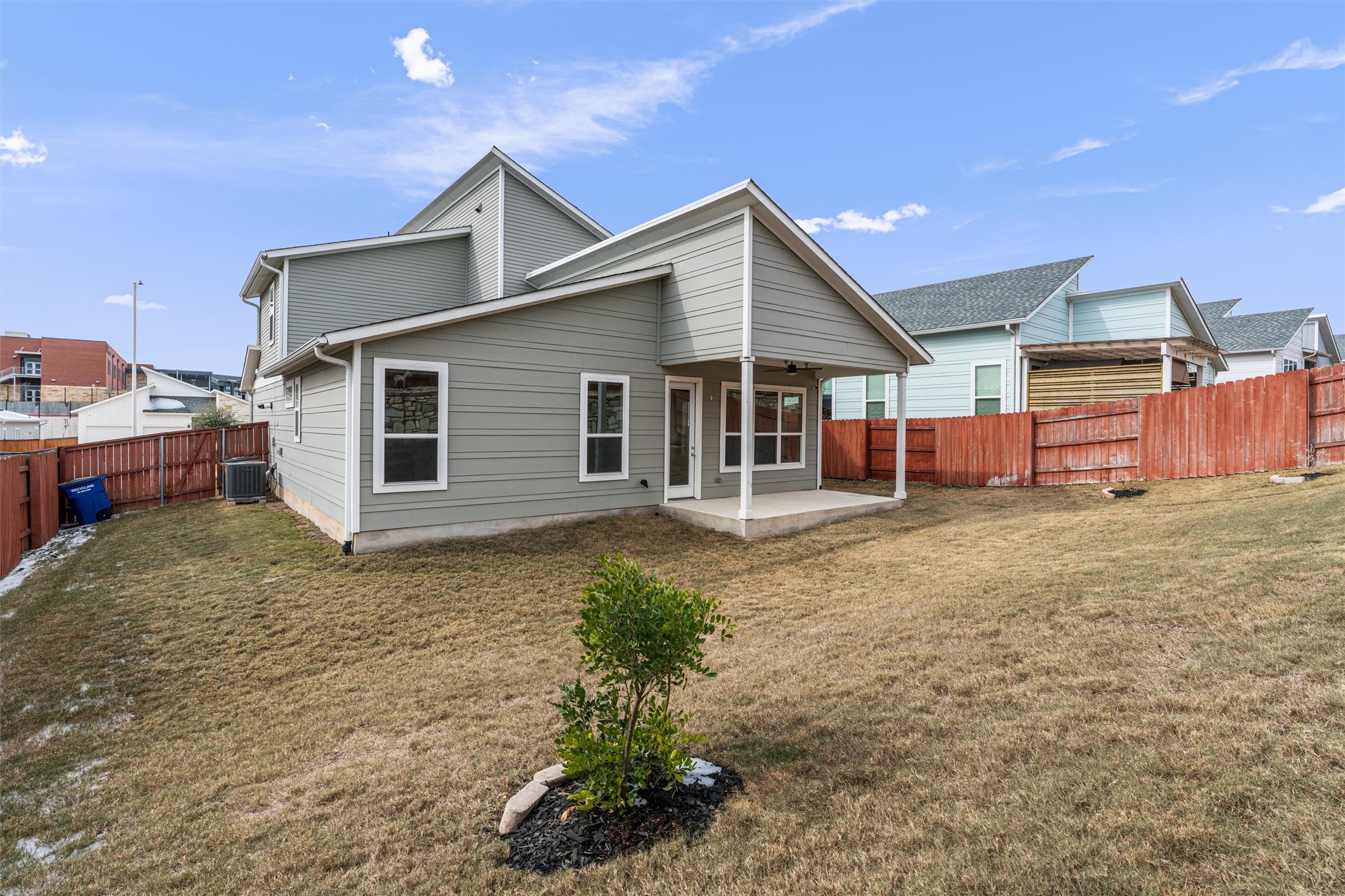 11217 Charger Way Manor, TX 78653 - Photo 30 of 35 Back of house featuring a patio, a fenced backyard, and a ceiling fan