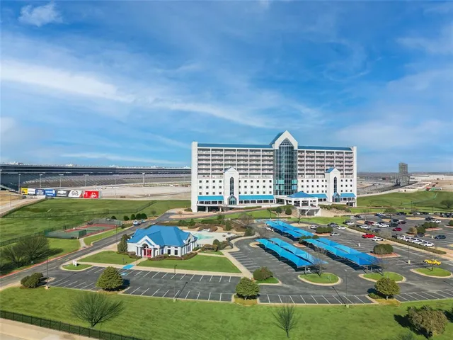 a view of swimming pool with outdoor space and seating area
