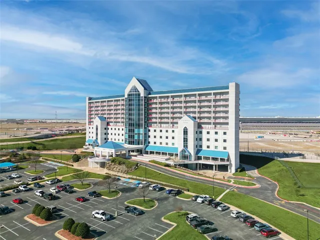 a view of a swimming pool with a yard