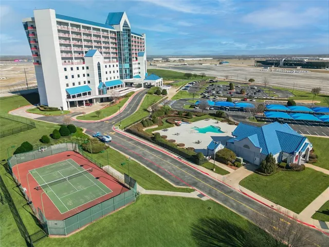 a view of a balcony with wooden floor
