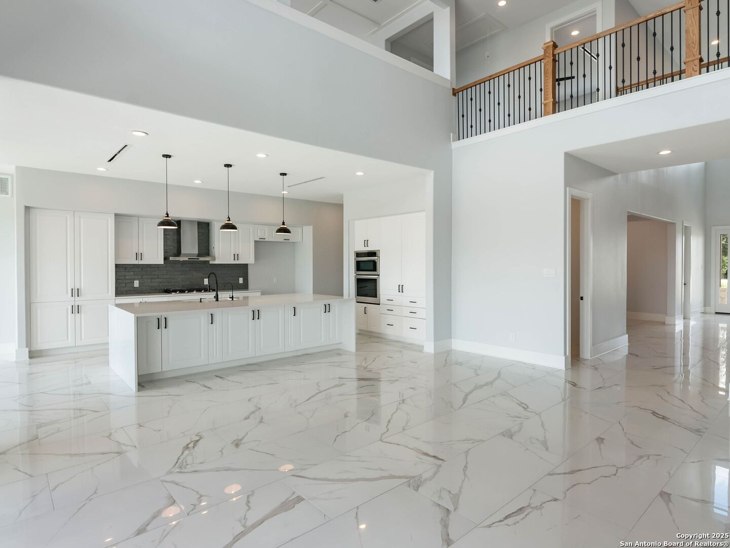 1054 Star Ridge Spring Branch, TX 78070 - Photo 13 of 42 a large white building with kitchen view