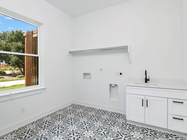 a view of a closet area with an empty room