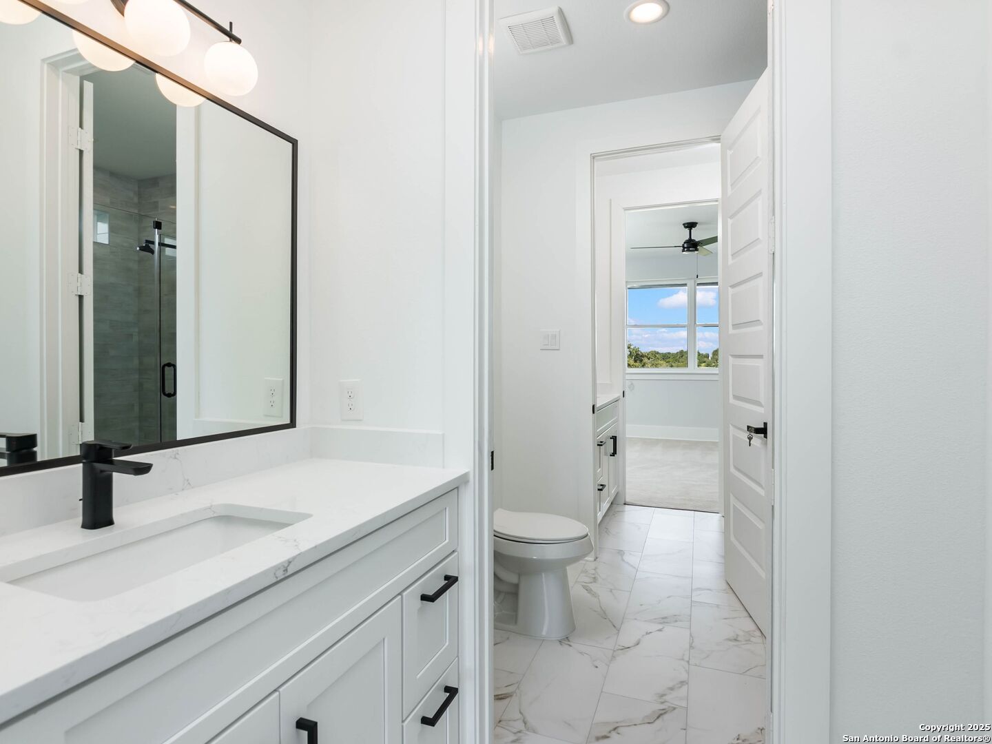 1054 Star Ridge Spring Branch, TX 78070 - Photo 33 of 42 a bathroom with a sink a toilet and shower