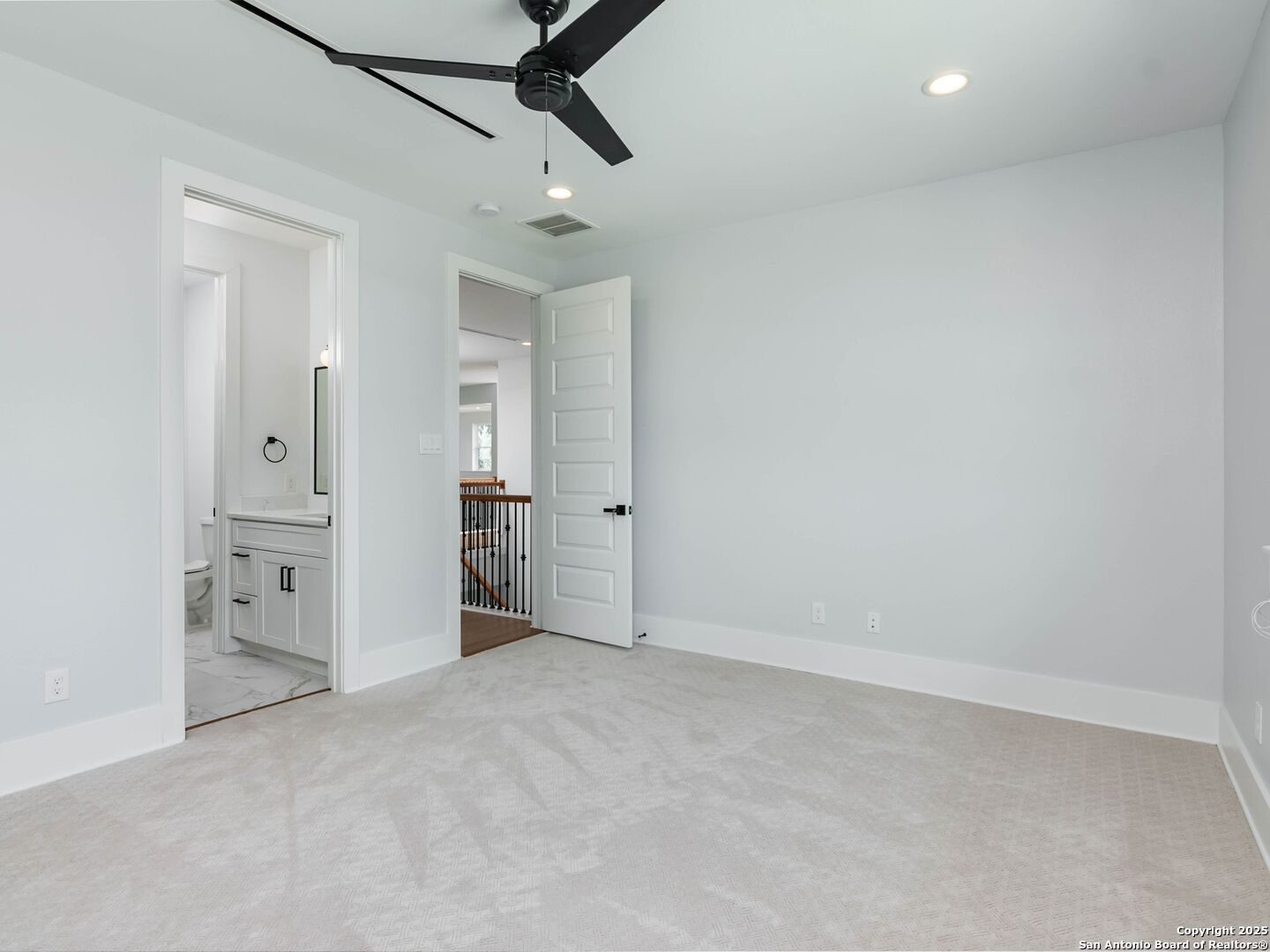 1054 Star Ridge Spring Branch, TX 78070 - Photo 34 of 42 en empty room with closet and wooden floor