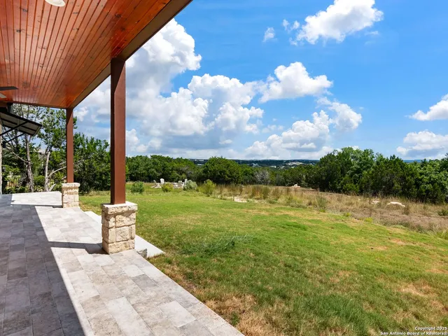 a view of a lake with a big yard