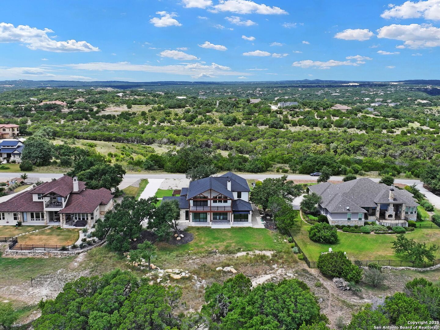 1054 Star Ridge Spring Branch, TX 78070 - Photo 42 of 42 an aerial view of a house with a garden
