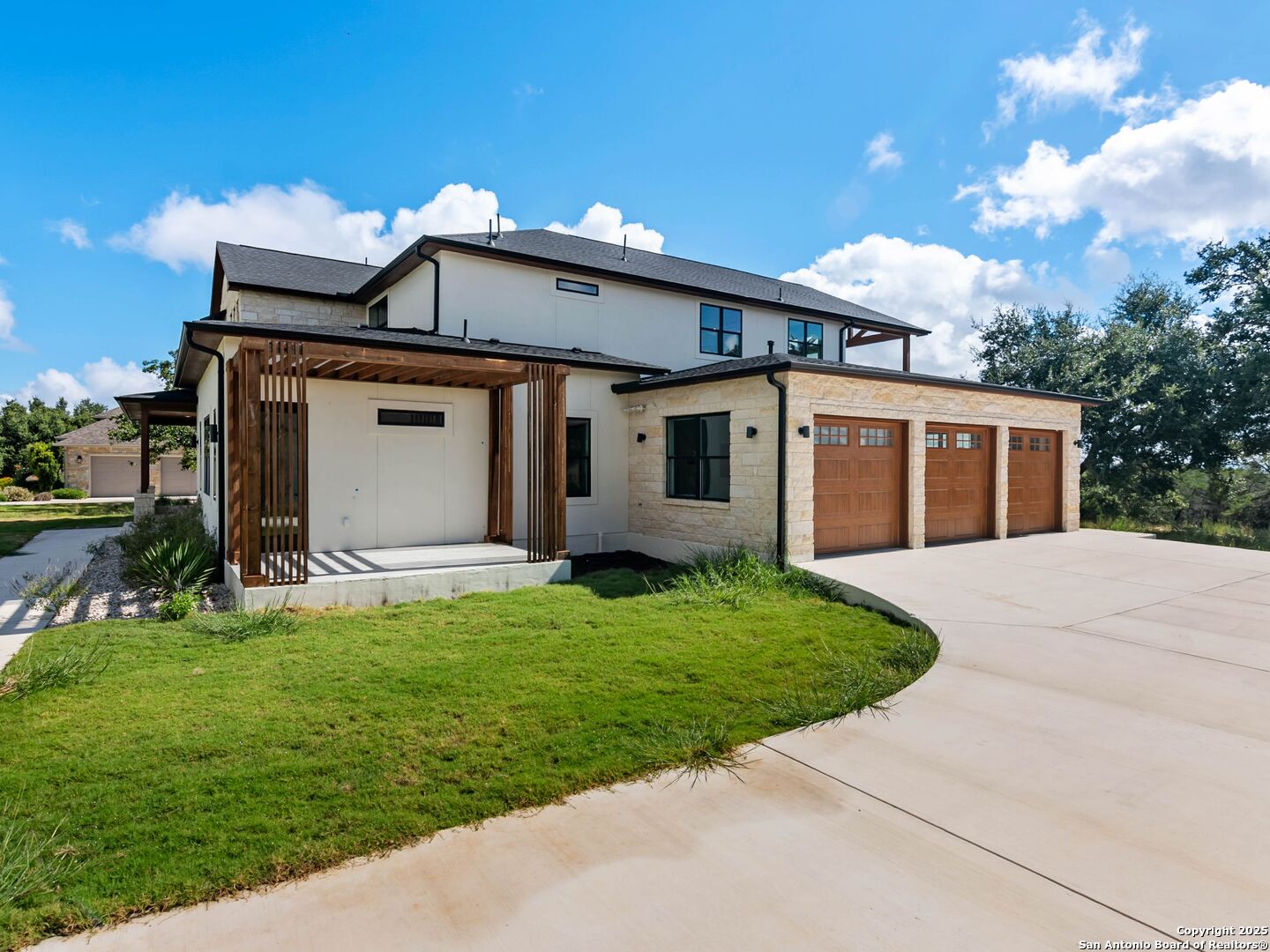 1054 Star Ridge Spring Branch, TX 78070 - Photo 6 of 42 a view of a house with a yard