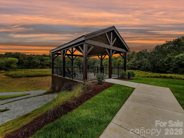 a view of swimming pool with a garden