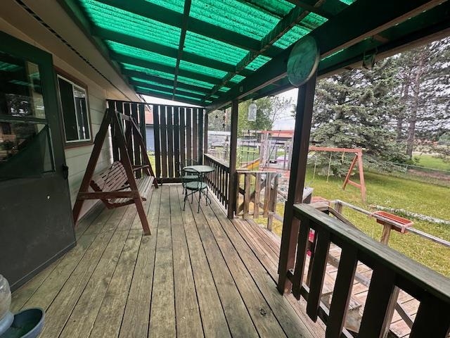 38 Locust Drive Babbitt, MN 55706 - Photo 21 of 29 Wooden deck featuring a yard