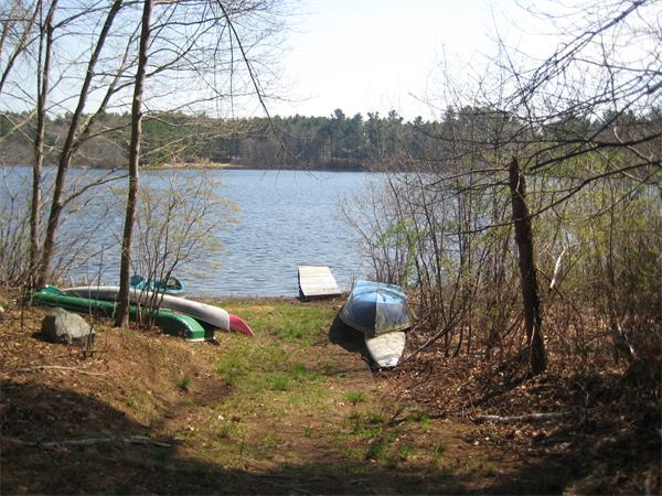 55 Boxford Road Ipswich, MA 01938 - Photo 19 of 21 a backyard of a house with table and chairs