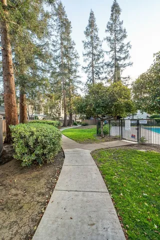 a view of backyard with green space