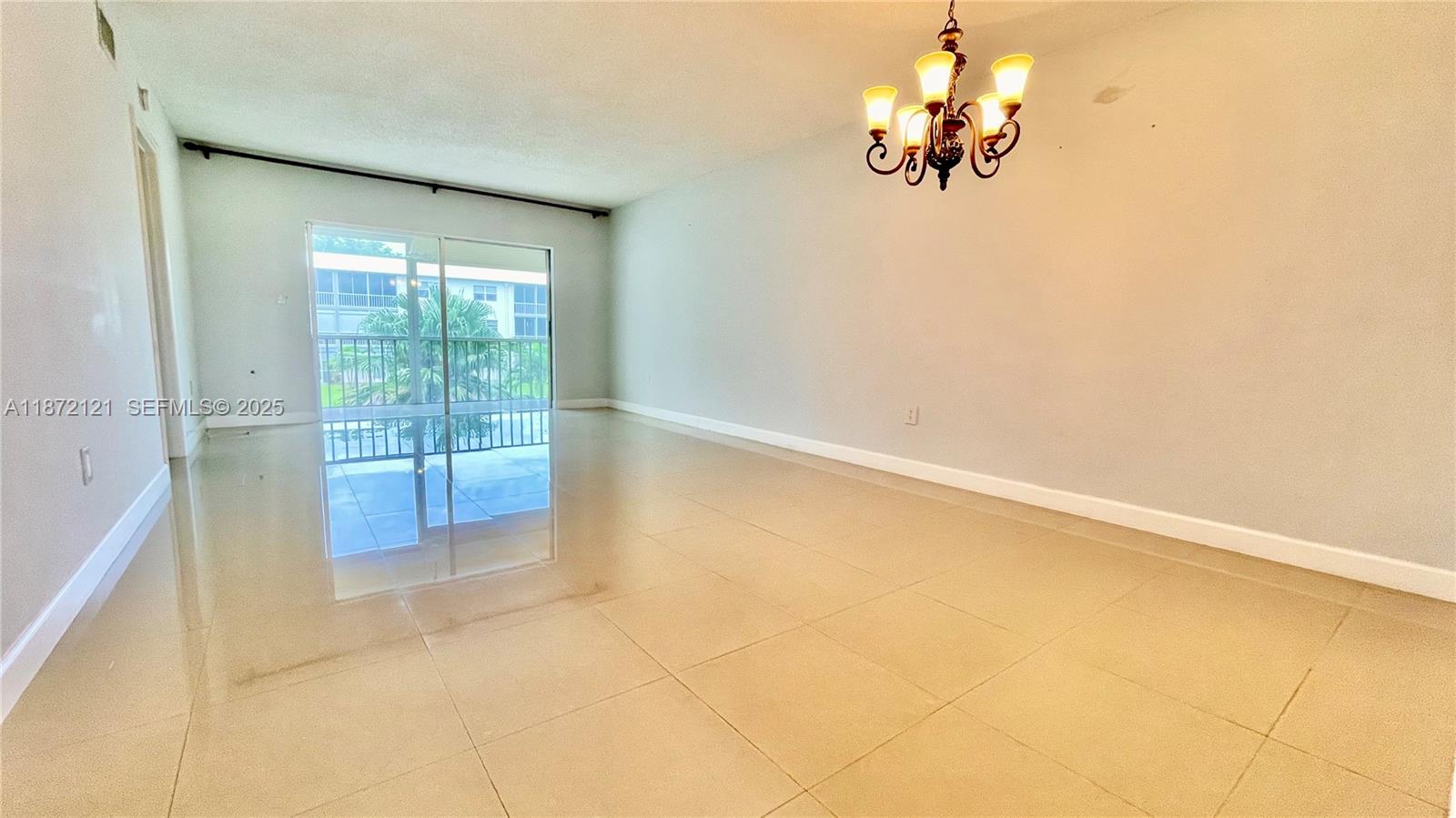 9856 Marina Boulevard, Unit 1320 Boca Raton, FL 33428 - Photo 16 of 48 a view of livingroom with window