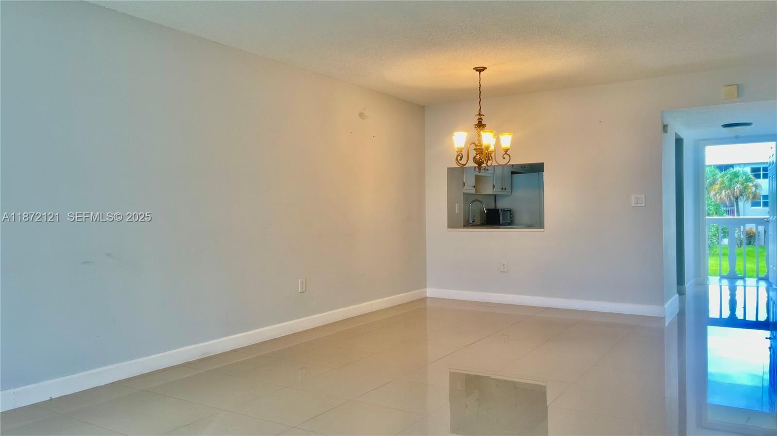 9856 Marina Boulevard, Unit 1320 Boca Raton, FL 33428 - Photo 24 of 48 a room that has a window in it