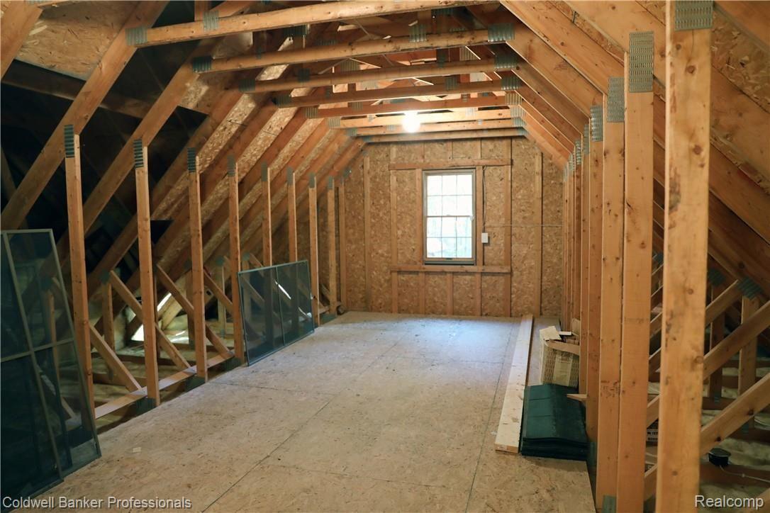 9840 Norman Road Clarkston, MI 48348 - Photo 37 of 45 Bonus room awaits your finishing touches.