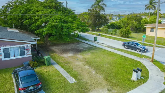 a view of a swimming pool with a garden