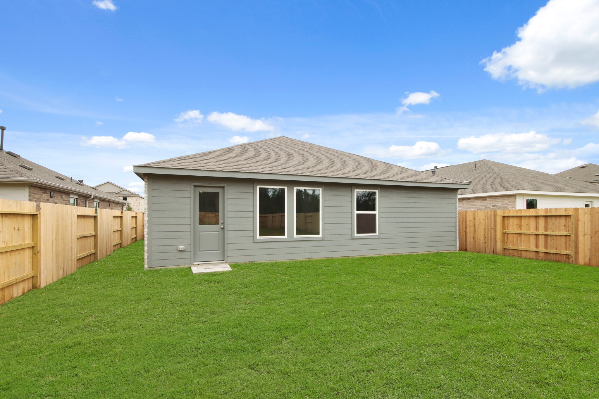 18779 Ribolla Drive New Caney, TX 77357 - Photo 24 of 24 Offering a simple and well-maintained backyard space.