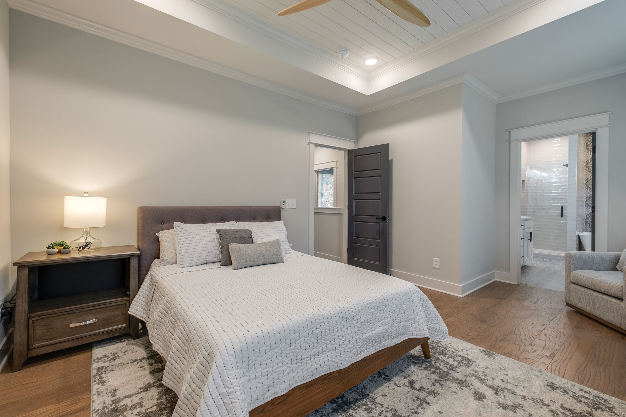 7110 Taylor Road Fairview, TN 37062 - Photo 17 of 31 a bedroom with a bed and wooden floor