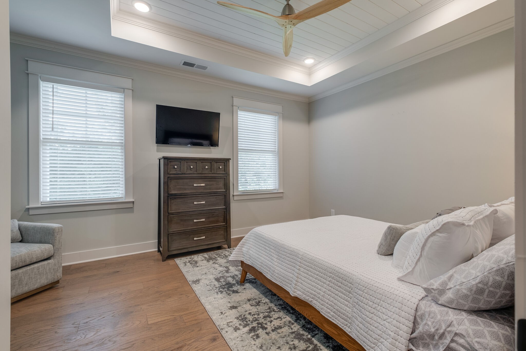 7110 Taylor Road Fairview, TN 37062 - Photo 18 of 31 a bedroom with a large bed and a television