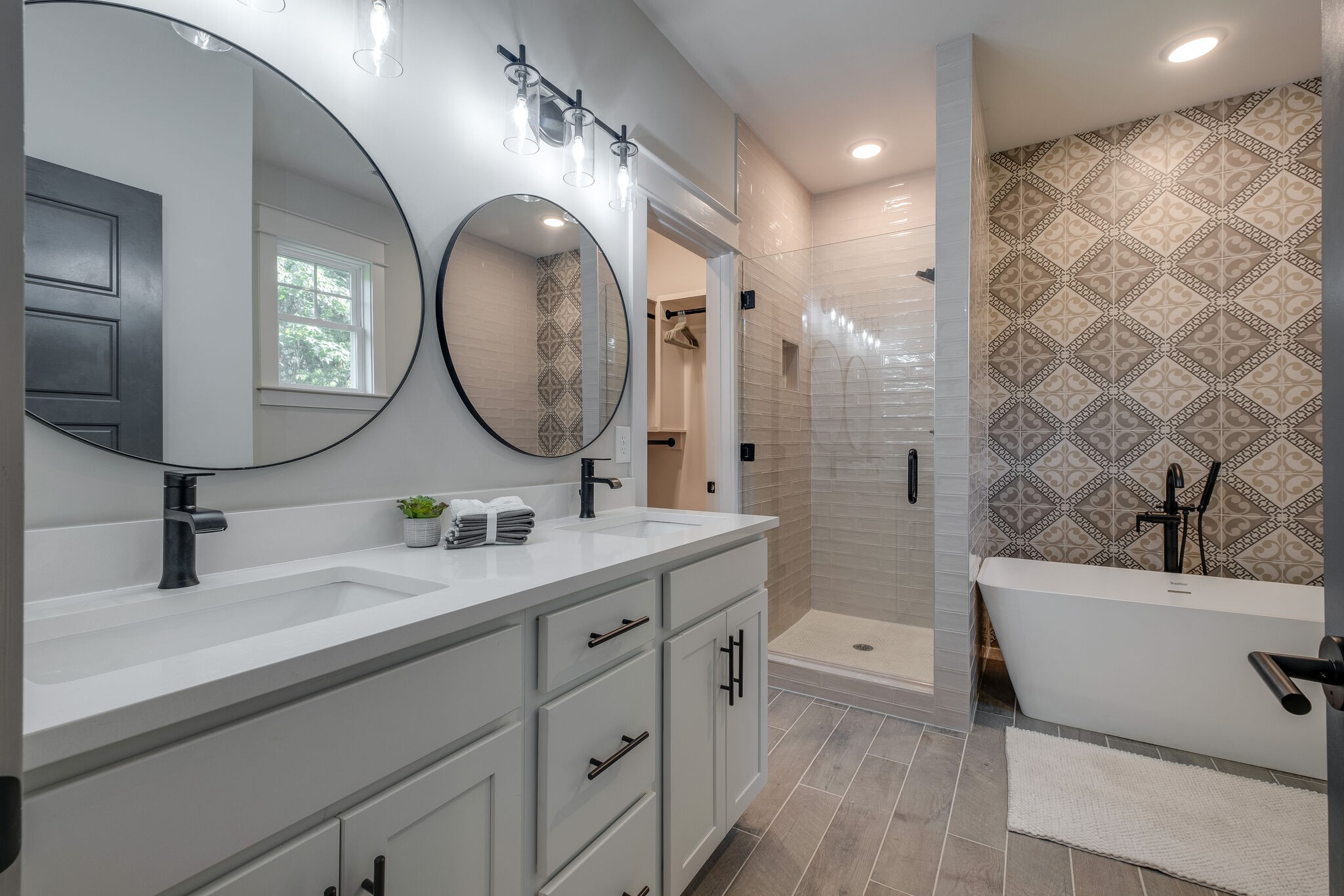 7110 Taylor Road Fairview, TN 37062 - Photo 19 of 31 a bathroom with a double vanity sink mirror and bathtub