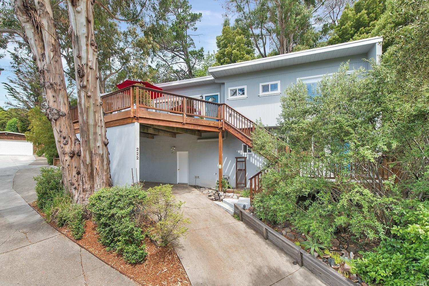 222 Jewell Street San Rafael, CA 94901 - Photo 1 of 1 a front view of a house with a yard and garage