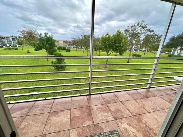 a view of a wooden fence
