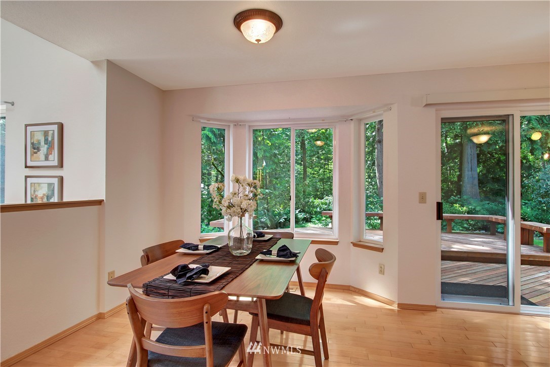 2126 164th Place Southeast Bothell, WA 98012 - Photo 5 of 18 a view of a dining room with furniture window and outside view