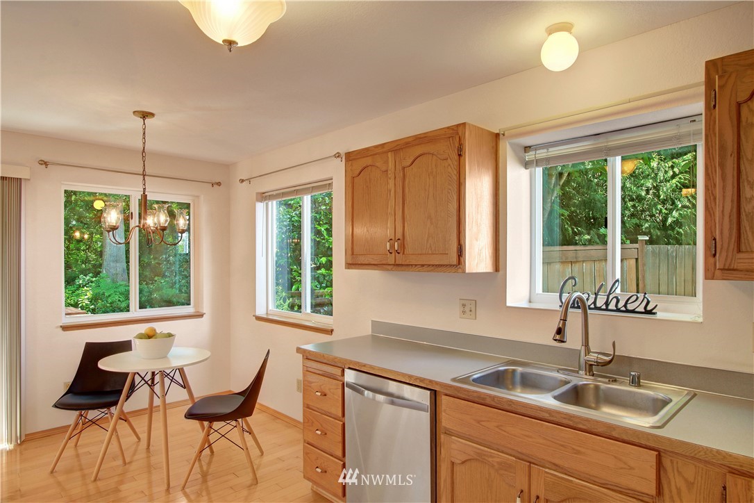 2126 164th Place Southeast Bothell, WA 98012 - Photo 6 of 18 a kitchen that has a sink and a window