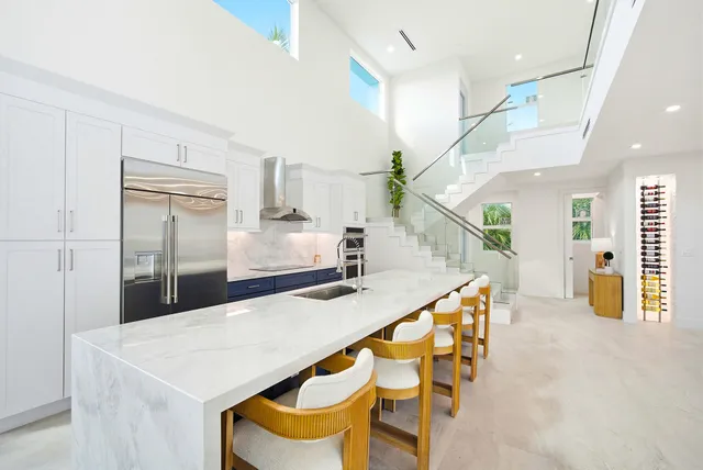 a building outdoor space with patio furniture and garden view