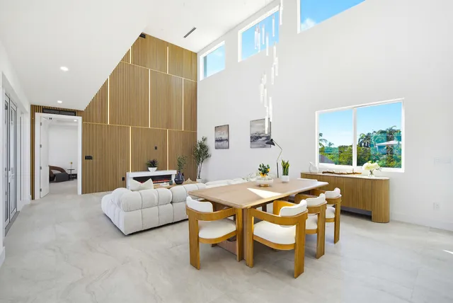 a view of a workspace with furniture and a livingroom