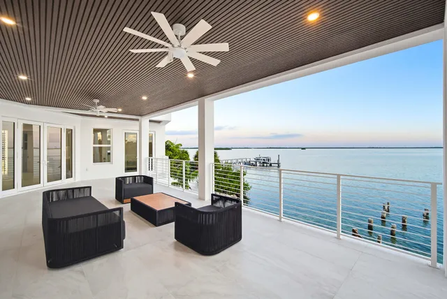 a living room view with a swimming pool
