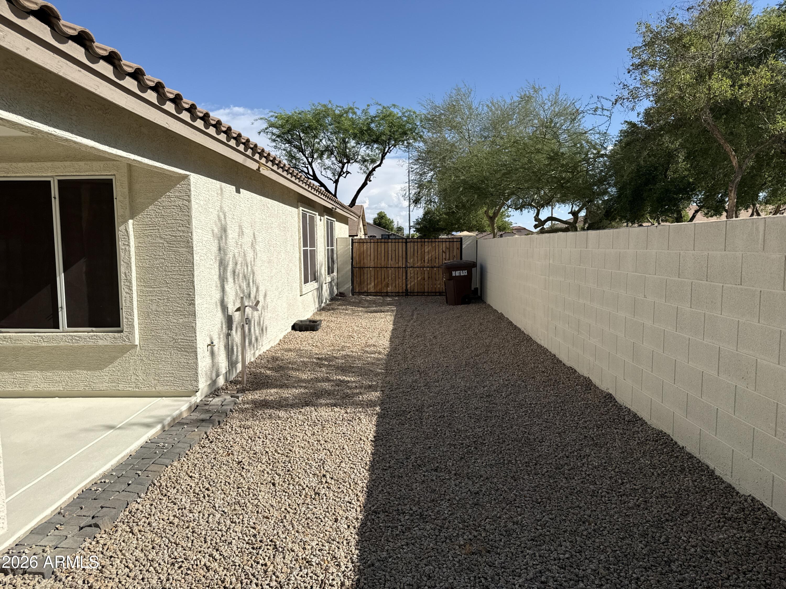 9630 West Reno View Drive Peoria, AZ 85345 - Photo 21 of 21 a view of a pathway of a house