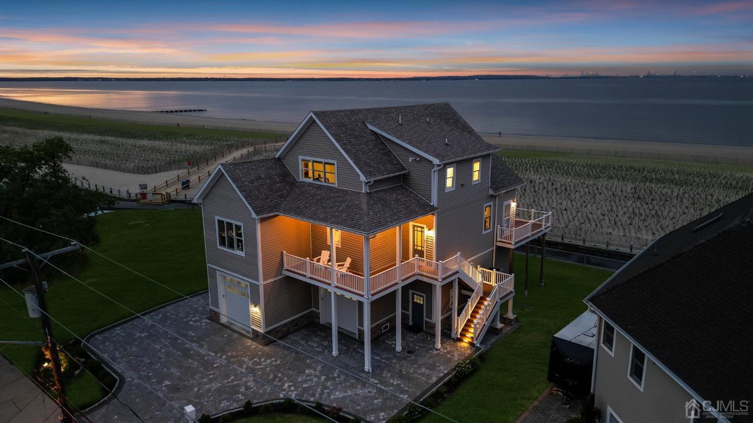 629 Front Street Union Beach, NJ 07735 - Photo 2 of 63 a front view of a house with a yard