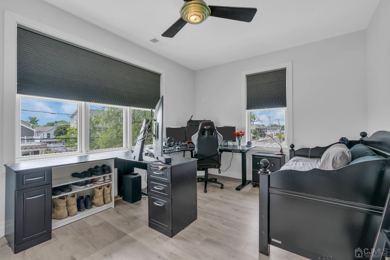 629 Front Street Union Beach, NJ 07735 - Photo 29 of 63 a work room with furniture and a window
